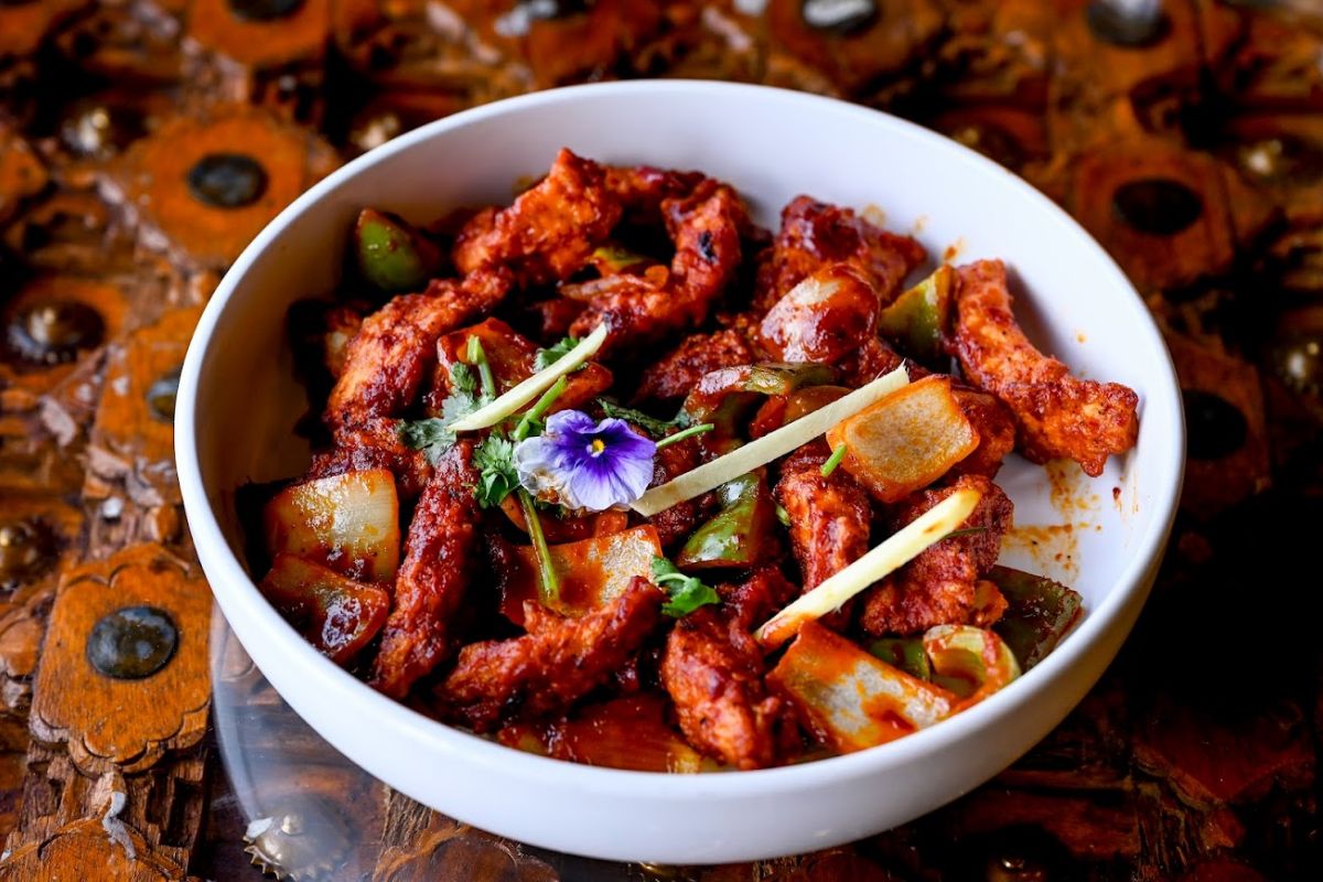 Indo-Chinese chilli chicken with peppers and onions